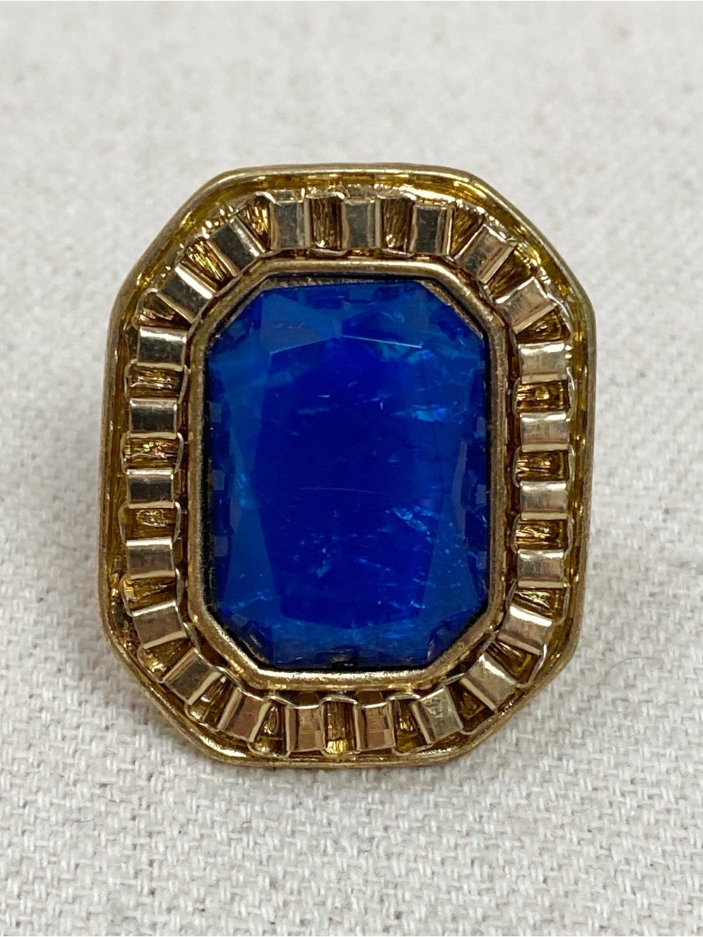 Gold-Tone Statement Ring with Deep Blue Stone